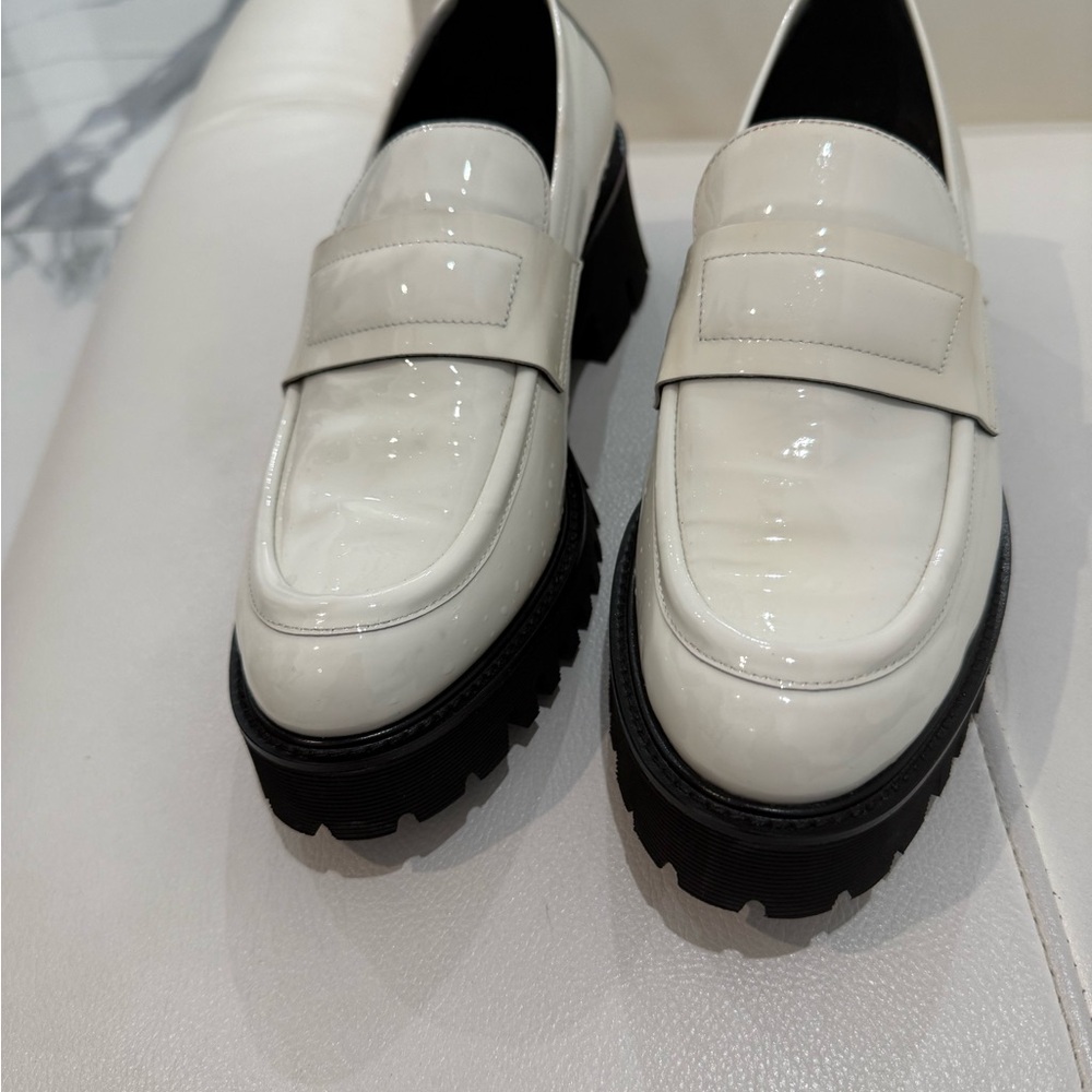 M. Gemi made in Italy Women’s White and Black Platform Flats with Glossy Finish.